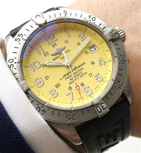 yellow breitling pill